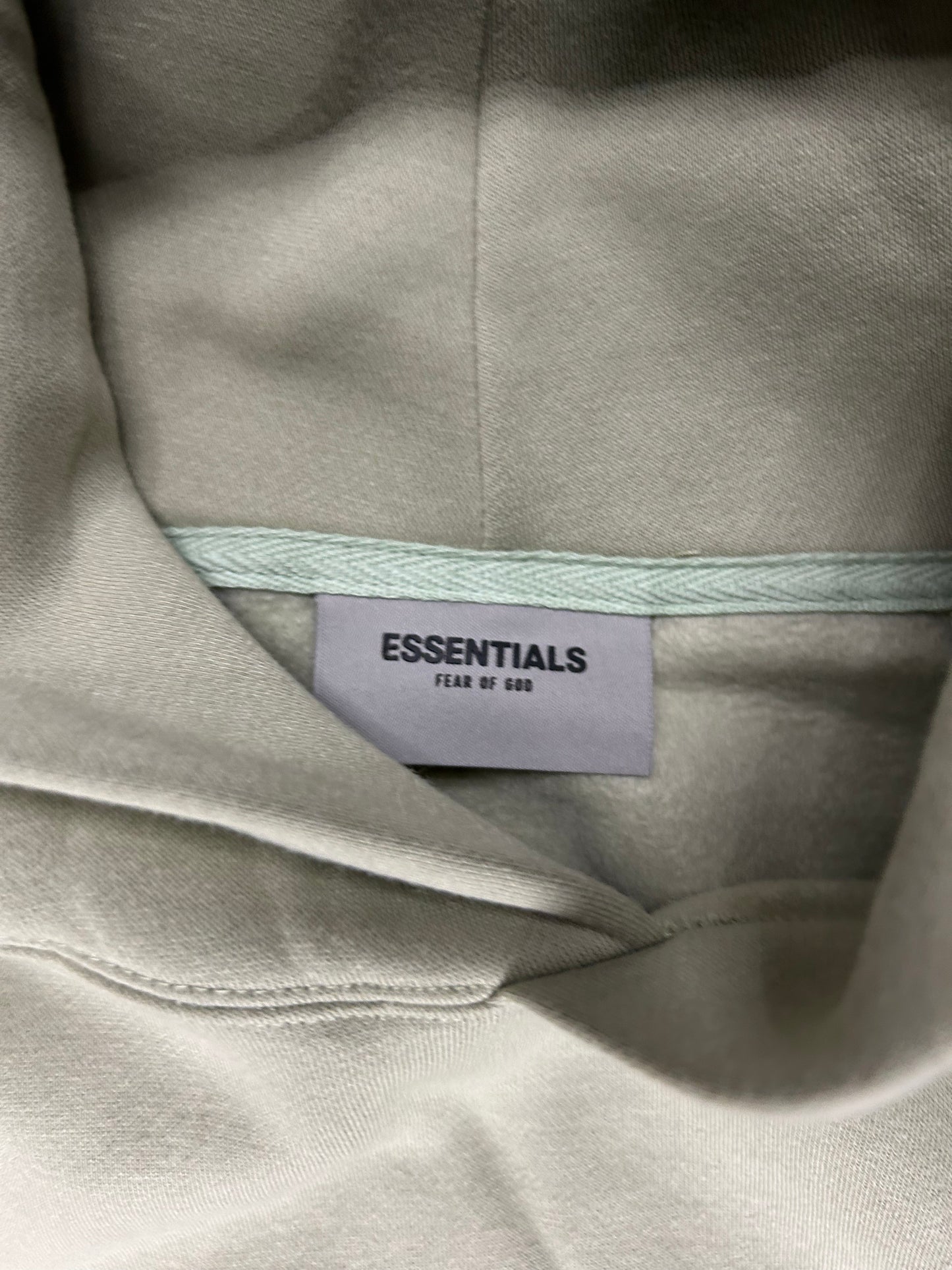ESSENTIALS GREEN HOODIE FADED (PRE OWNED)